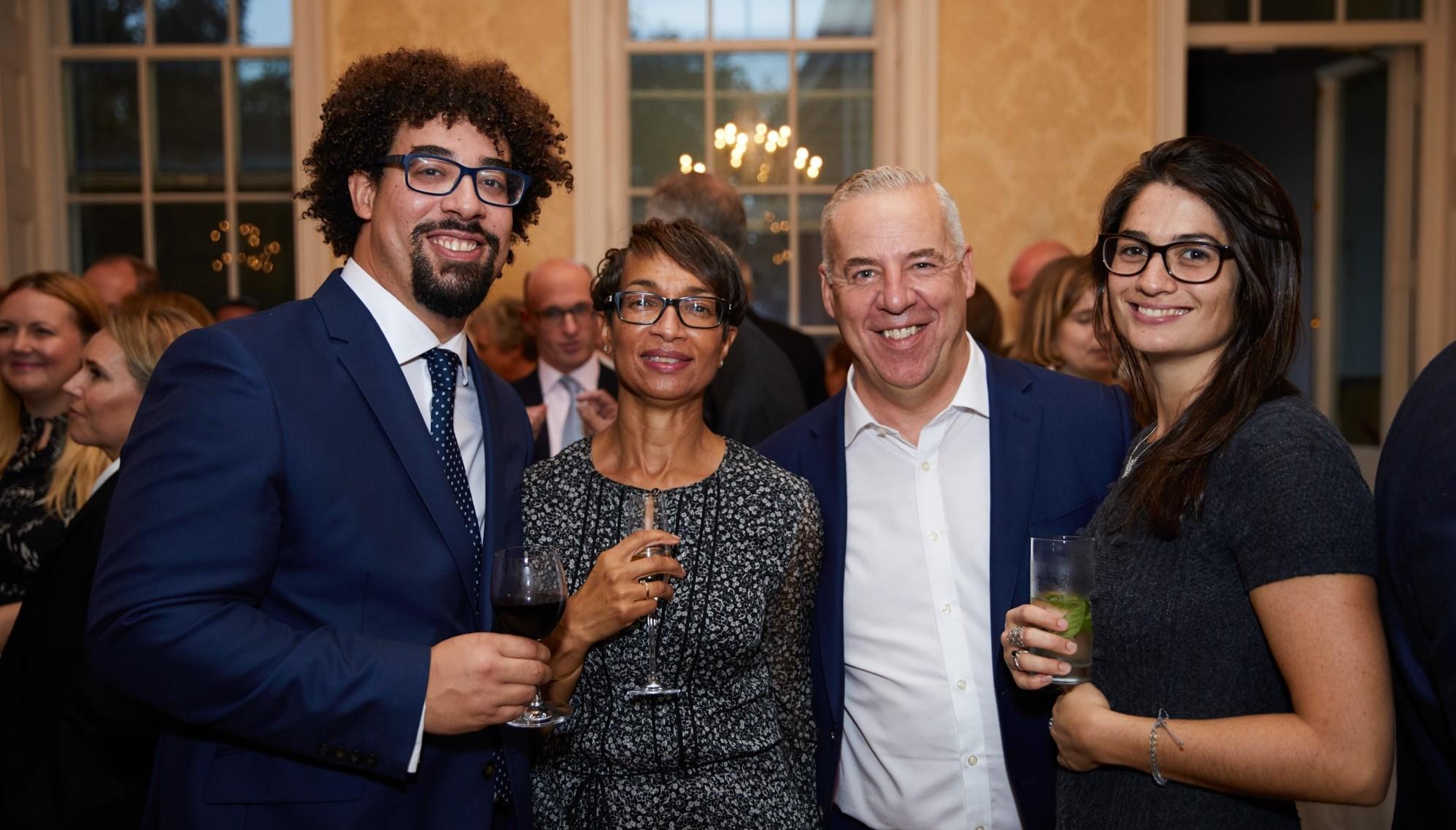 Our giving community brings together visionary donors with a common goal to beat cancer Family enjoy a thanking event