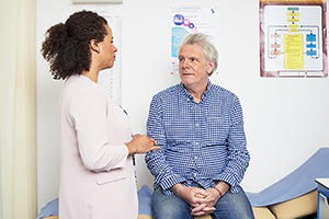 GP pictured with patient