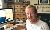 Online Panel member Guy at his desk