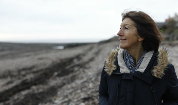 Linda, a supporter, on the beach