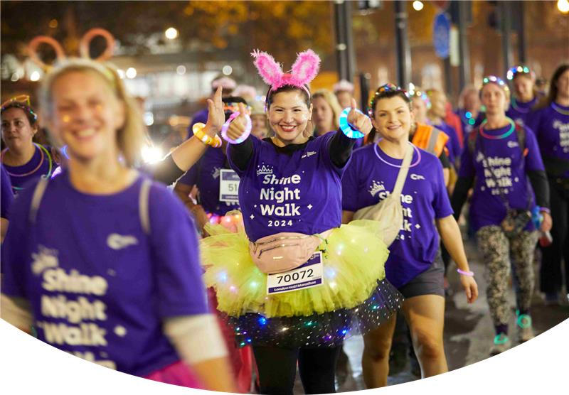 people participating in shine night walk