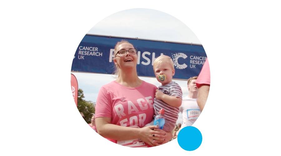 Mother with child in race