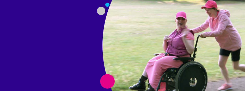 Photo of two fundraisers taking part in Race for Life
