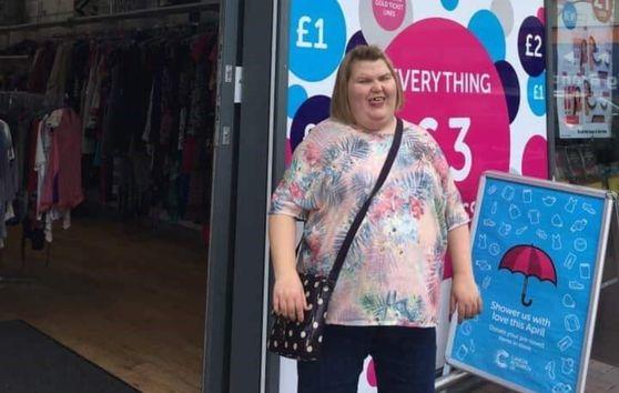 Jessica standing in front of the shop