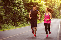 Joggers in countryside