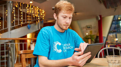 volunteer taking a campaigning action on a tablet