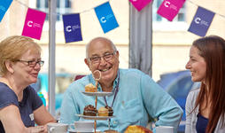 Man smiling at CRUK fundraising event Man smiling at CRUK fundraising event