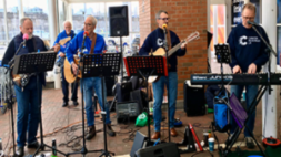 loose change buskers performing