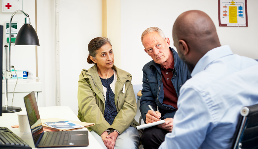 couple talking to a doctor