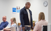 man arriving at hospital appointment