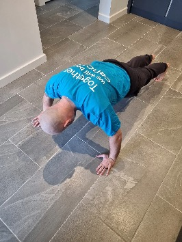 Photo of a man smiling taking part in the challenge