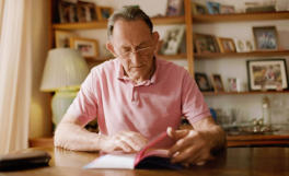 man reading book