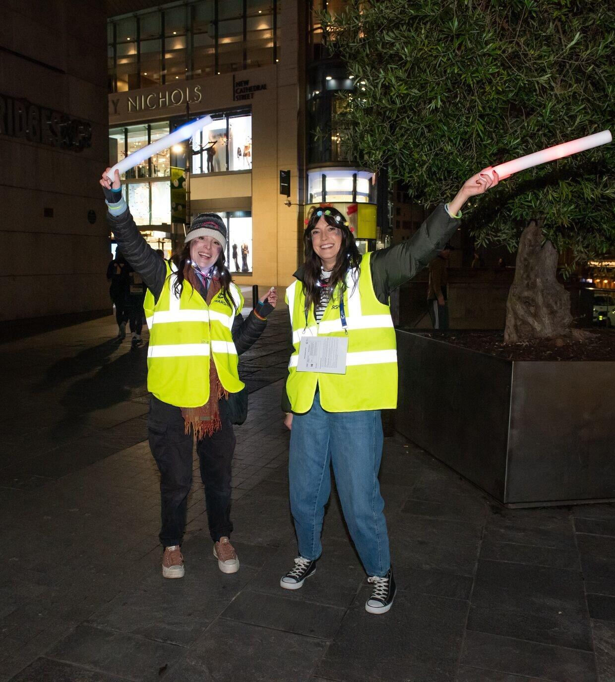 Two shine night volunteer smiling