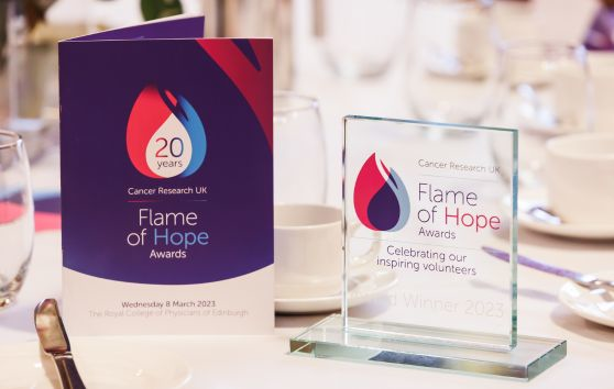 Flame of Hope awards event programme and trophy