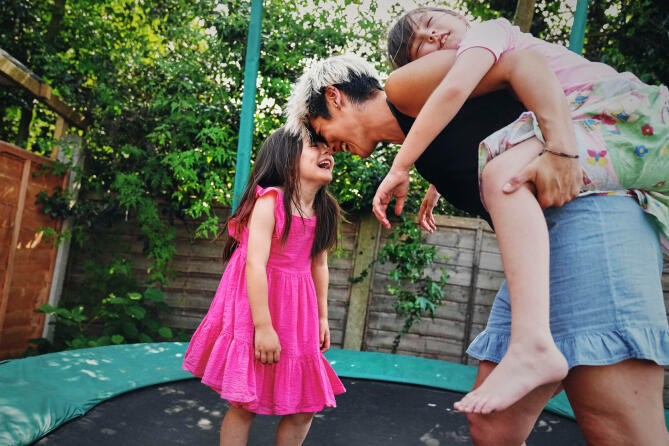 A photo of Mei-Ling with her daughters