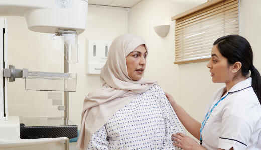 A photo of a nurse with a patient