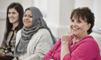 women in group conversation