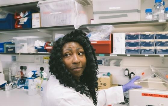 A Cancer Research researcher in her lab