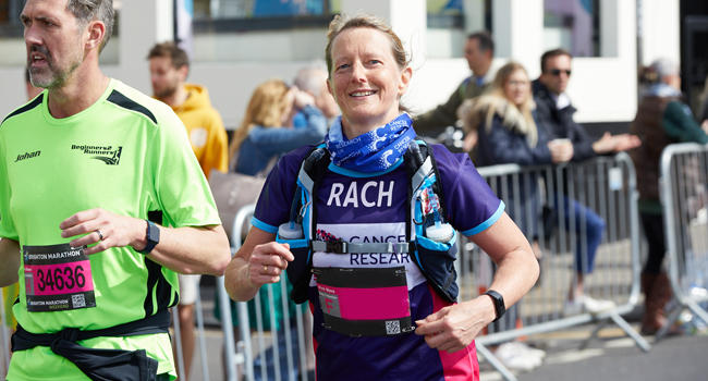 Woman running in a CRUK top 