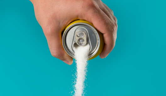 Sugar pouring out of can.