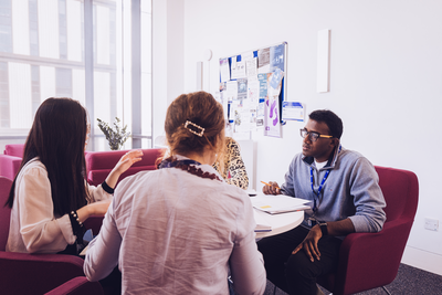 Group of researchers having a discussion