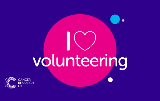 Social media badge with a purple background, and a pink circle in the middle. Across the centre, there is white text reading 'I love volunteering' with a heart icon instead of the word 'love'.