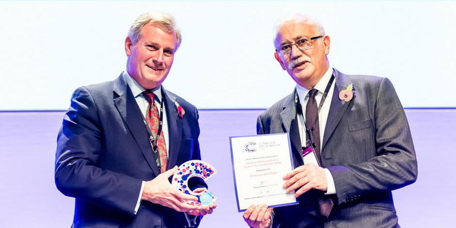 Photo of Stan Kaye receiving an award