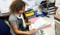 Woman looking at paperwork
