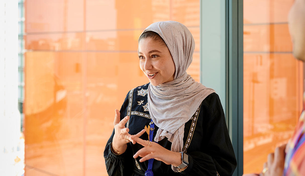 Photo of a person talking in the office