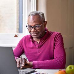A volunteer researching about Cancer Research UK