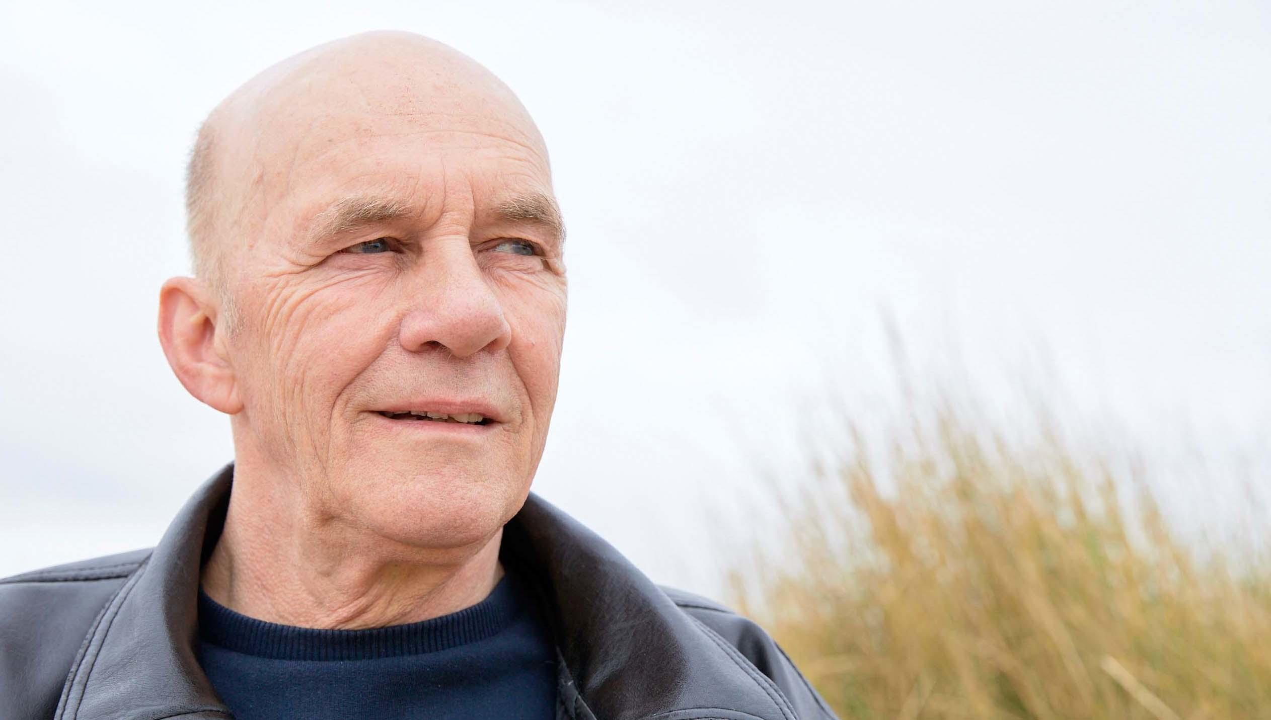 Tommy, a bladder cancer patient, on the beach