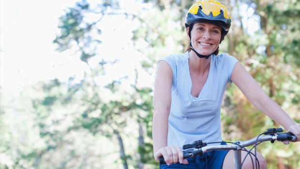 women cycling on a bike