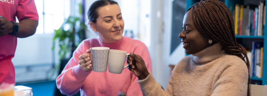 Two women smiling 