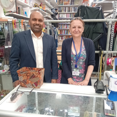 MP inside the shop with a member of staff