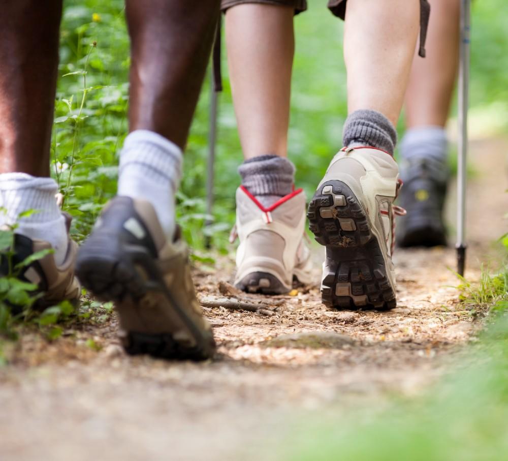 Hiking boots on a muddy path