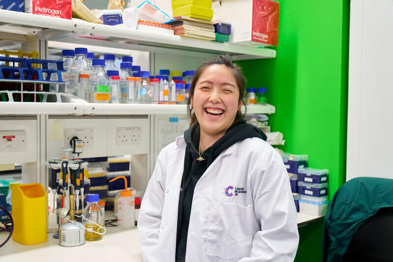 image of smiling female researcher in a laboratory