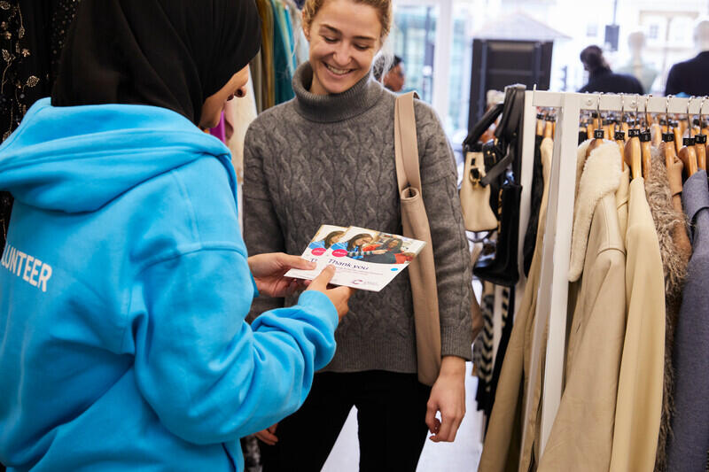 Shop Volunteer helping
