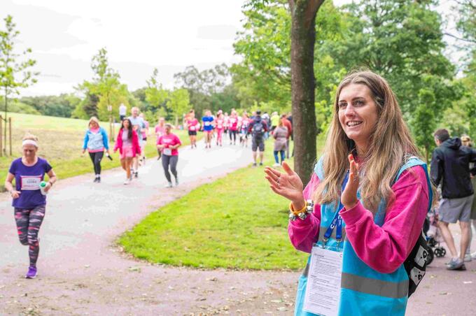 Volunteers cheering at event