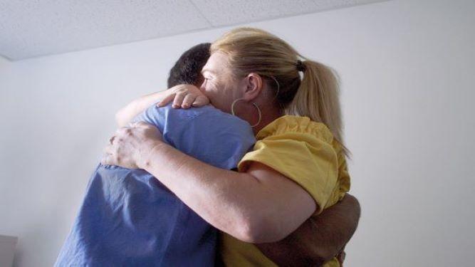 An image of two people embracing 