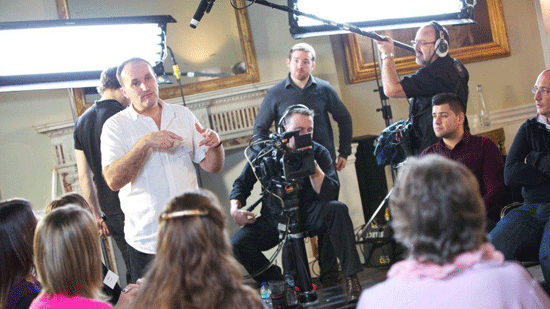a media volunteer being filmed