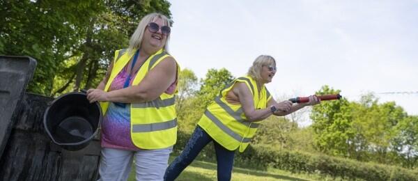 Volunteers cheering at event