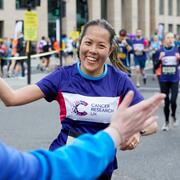 Runner high fiving