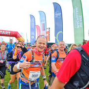 Man at start line with his thumbs up