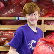 Young male stock processer volunteer